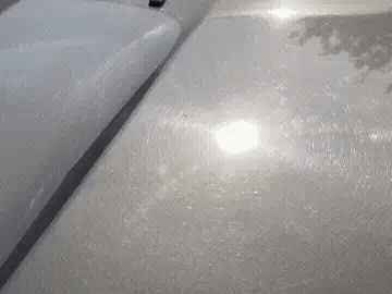 Animated illustration: car wash showing light scratches/swirl marks appearing during washing
